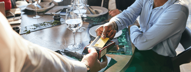 Customer providing credit card for payment