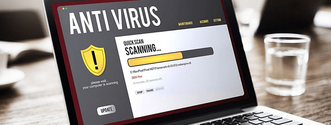 Laptop showing anti-virus software performing a scan.