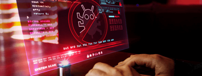 Developer at a glowing red terminal.