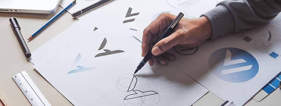 Designer drawing a logo