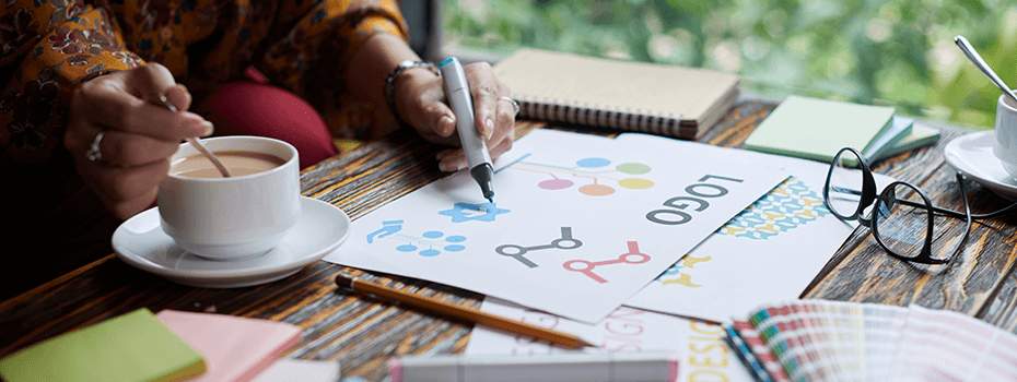 Illustrator exploring logo ideas